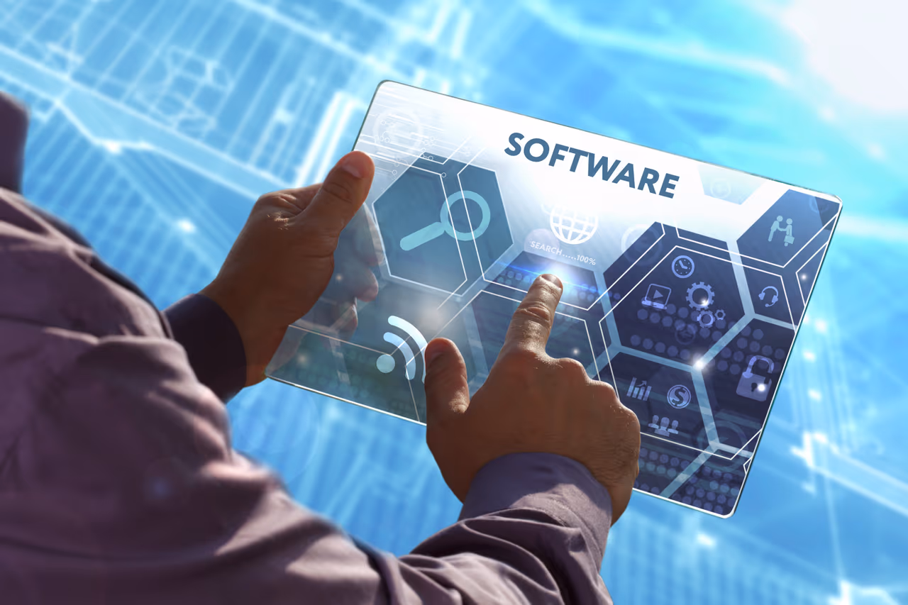 Business, Technology, Internet and network concept . Young business man working on the tablet of the future , select the virtual screen: Software